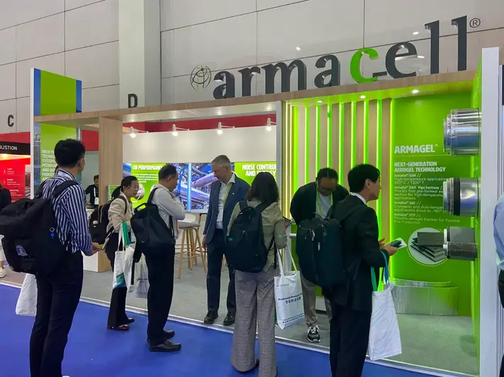 Visitors exploring the product displays on Armacell's stand at Gastech