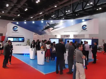 Busy EUROCONTROL stand at ATC Global with software demo screens