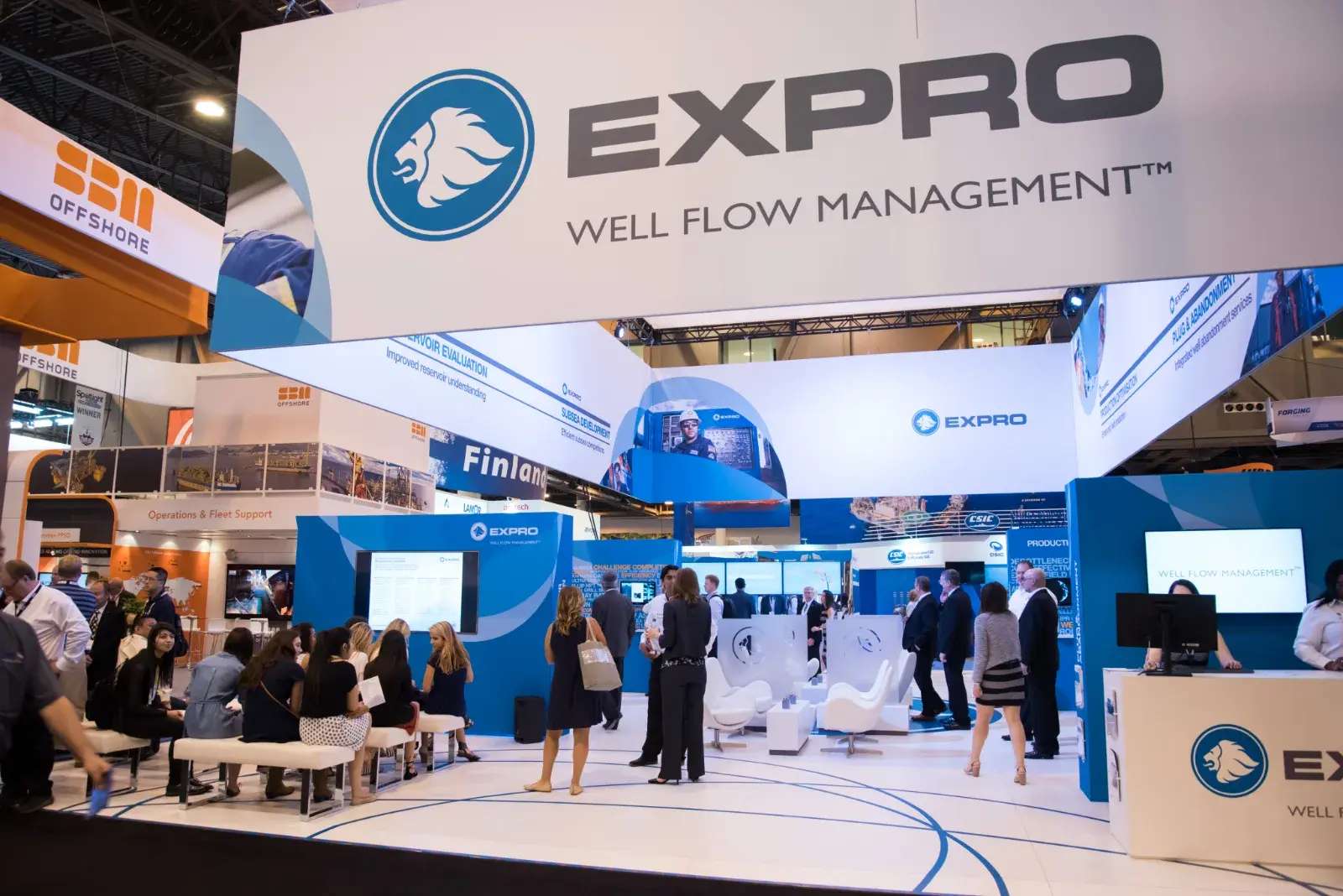 Visitors on Expro's exhibition stand, built through our production network
