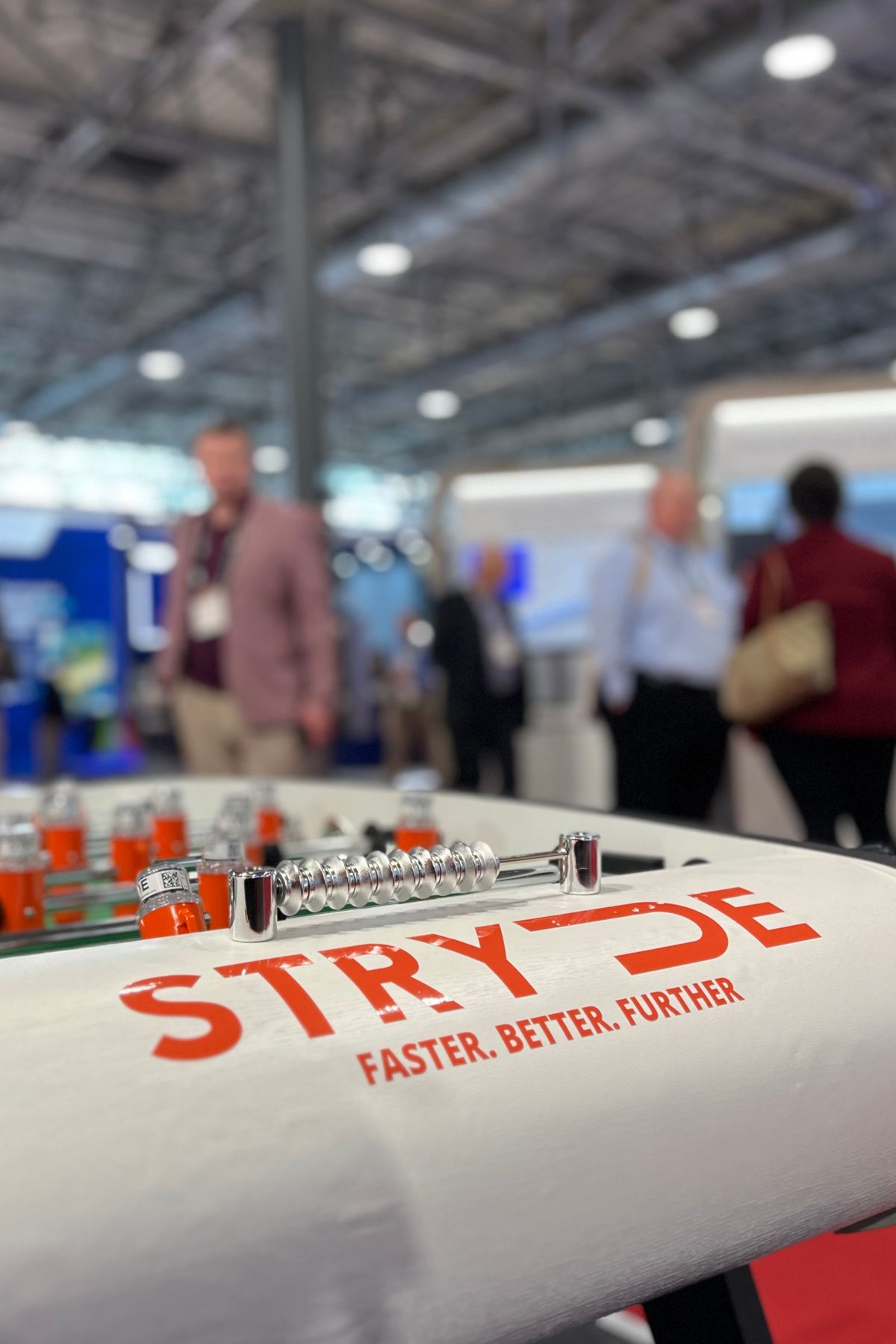 STRYDE-branded table football table with nodes in place of the usual handles